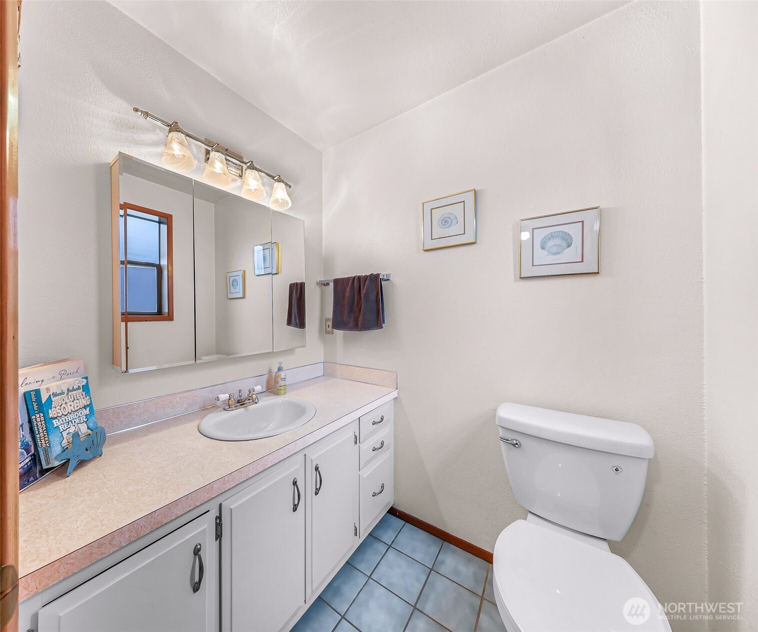 4877 Maple Lane Ferndale, WA 98248 - Photo 11 of 35 a bathroom with a toilet sink and mirror