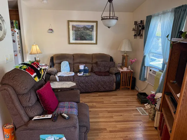 a view of a bedroom from a hallway