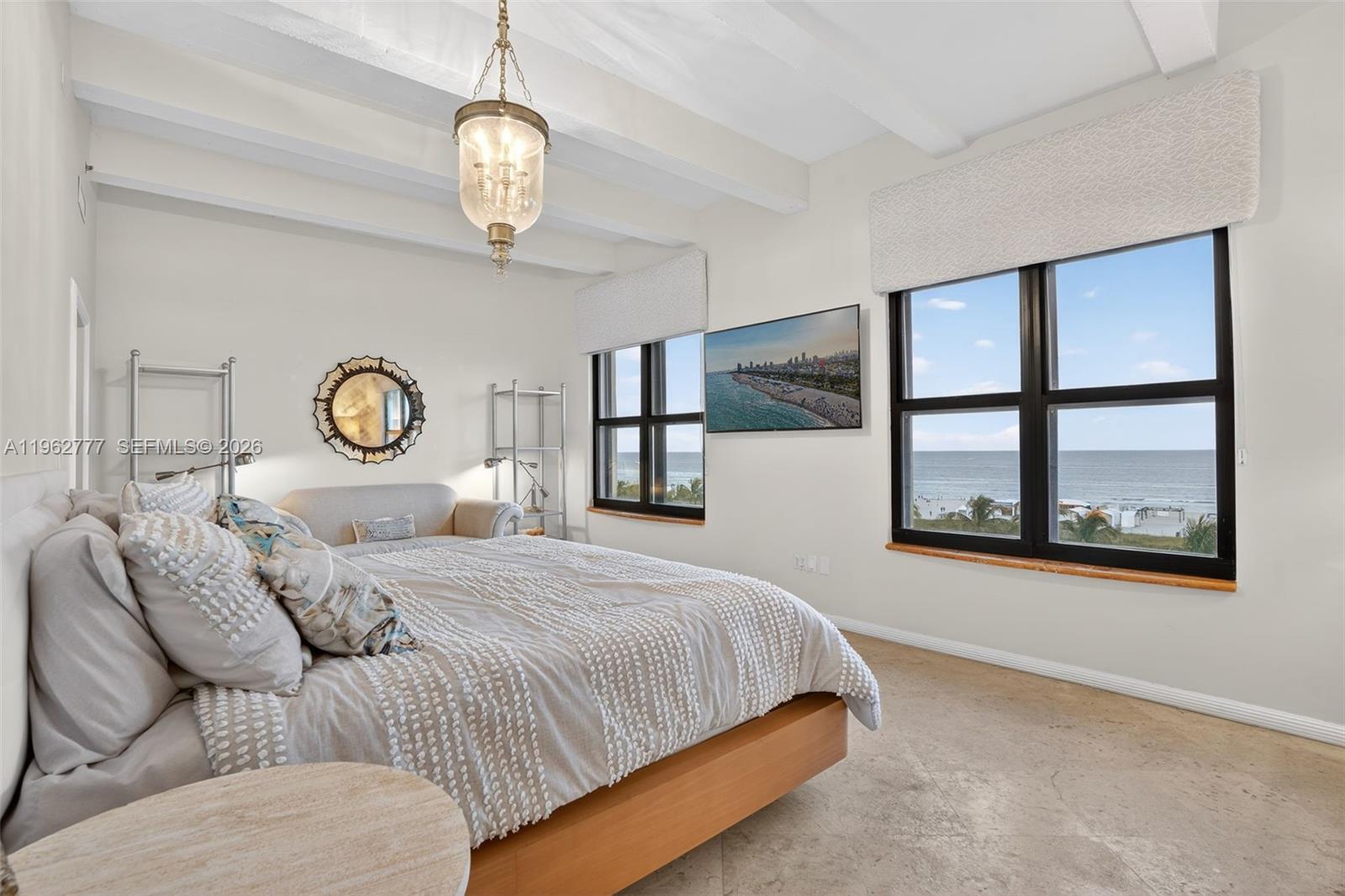 1330 Ocean Drive, Unit R7C Miami Beach, FL 33139 - Photo 13 of 21 a bedroom with bed and a window