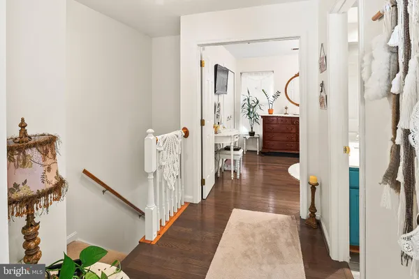 a view of a hallway view with living room