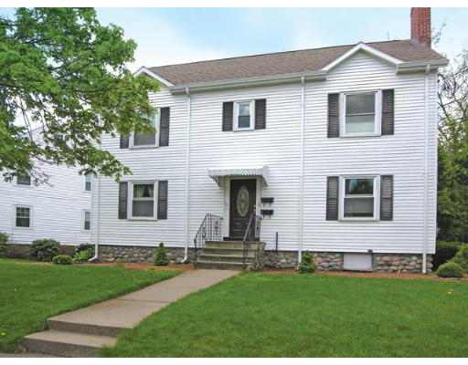 32 Miller Road, Unit 1 Newton, MA 02459 - Photo 1 of 1 a front view of a house with a yard