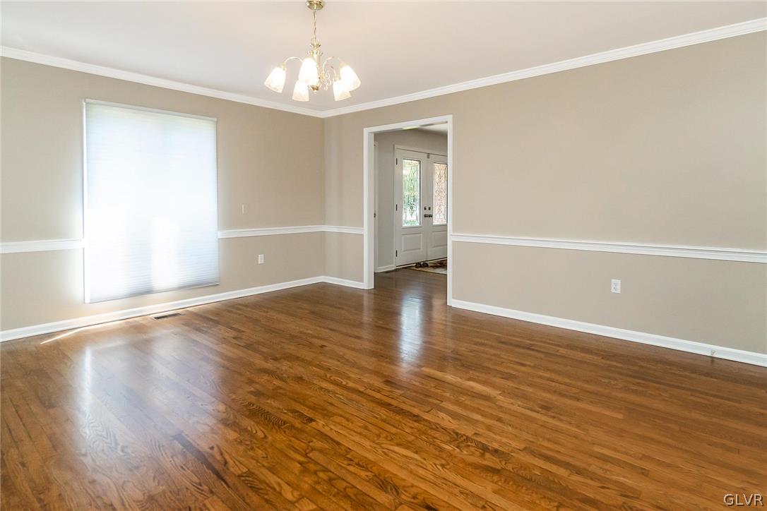 640 Macada Road Bethlehem, PA 18017 - Photo 12 of 48 an empty room with wooden floor and windows