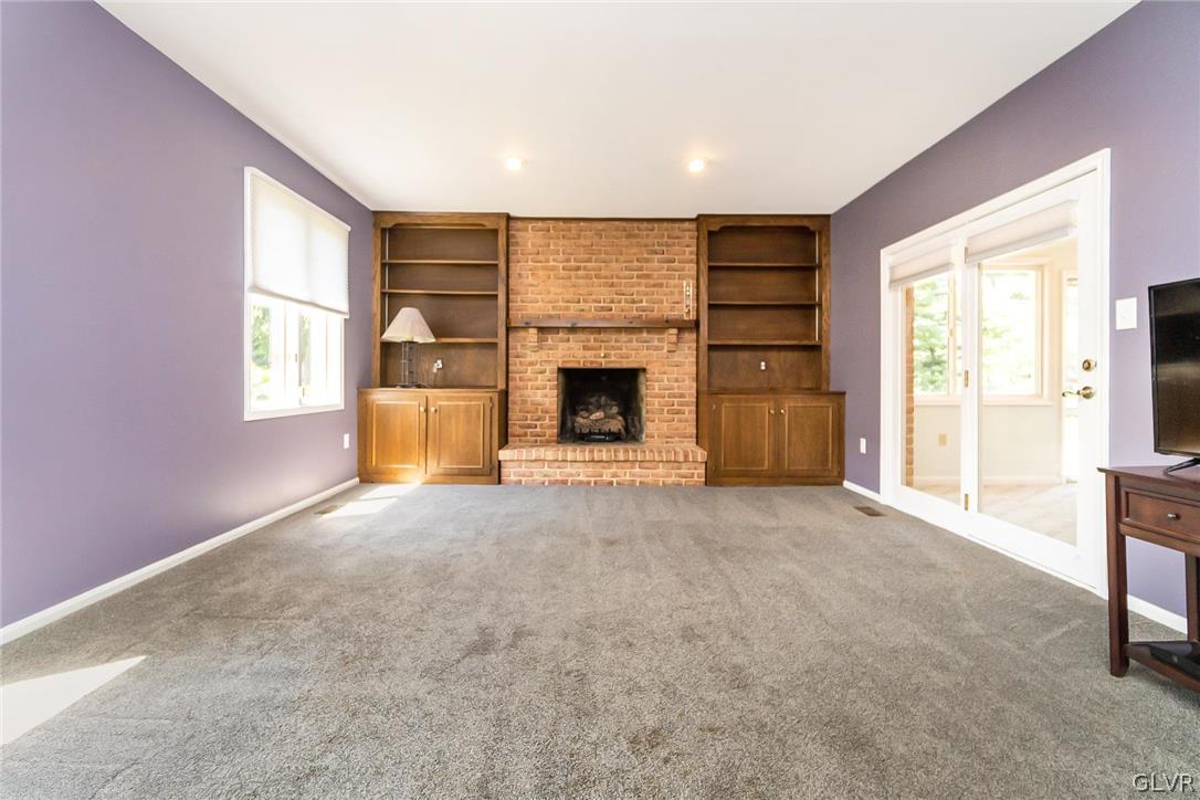 640 Macada Road Bethlehem, PA 18017 - Photo 23 of 48 an empty room with furniture and a fireplace