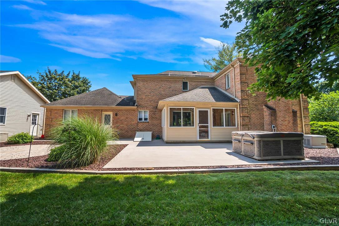 640 Macada Road Bethlehem, PA 18017 - Photo 3 of 48 a front view of a house with a garden