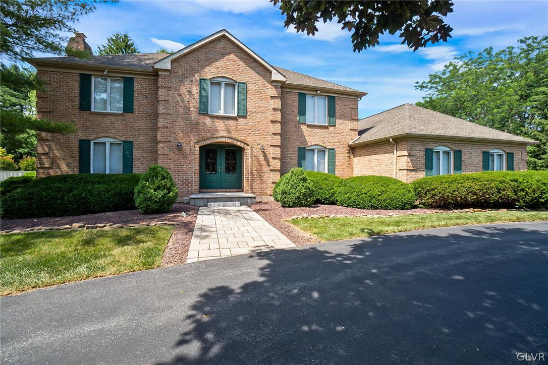 640 Macada Road Bethlehem, PA 18017 - Photo 40 of 48 a front view of a house with yard and green space