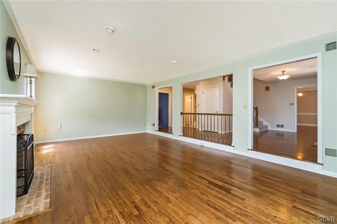 640 Macada Road Bethlehem, PA 18017 - Photo 8 of 48 a view of an empty room with wooden floor and a window
