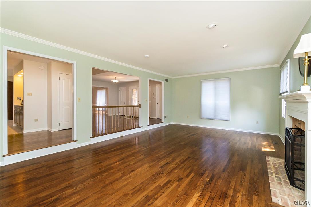 640 Macada Road Bethlehem, PA 18017 - Photo 9 of 48 a view of empty room with wooden floor and fireplace