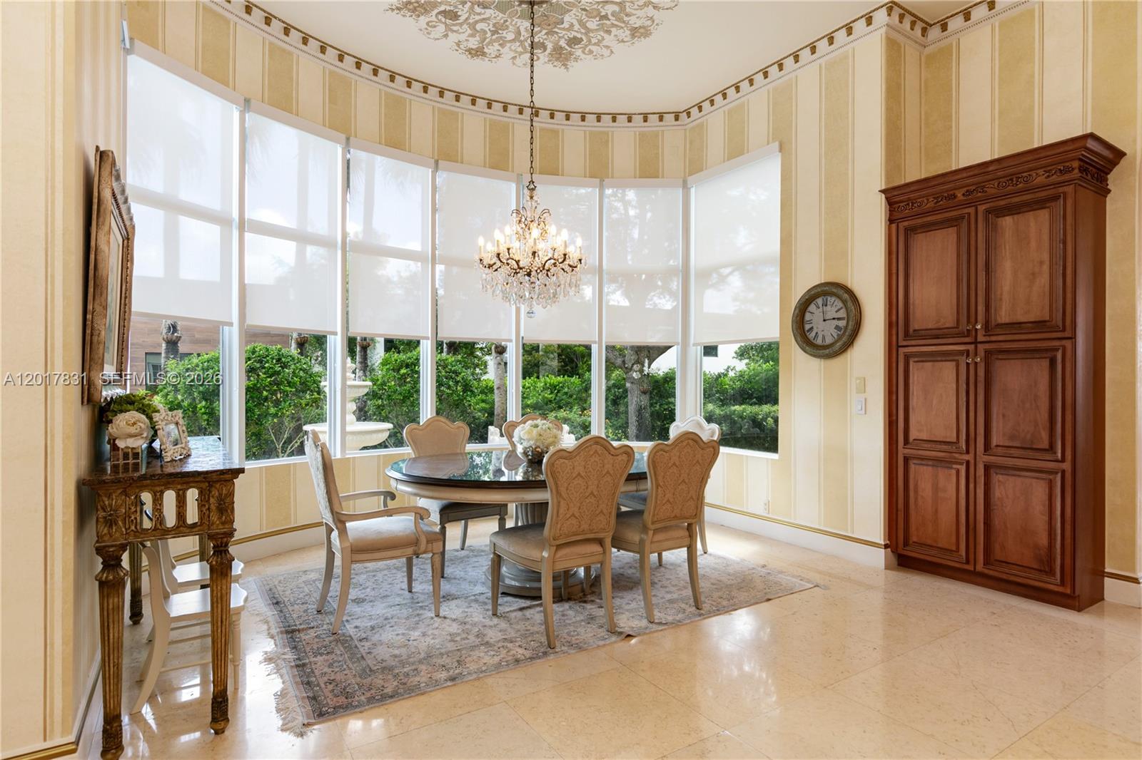 2951 Lake Ridge Lane Weston, FL 33332 - Photo 17 of 64 a dining room with furniture large windows and outdoor view