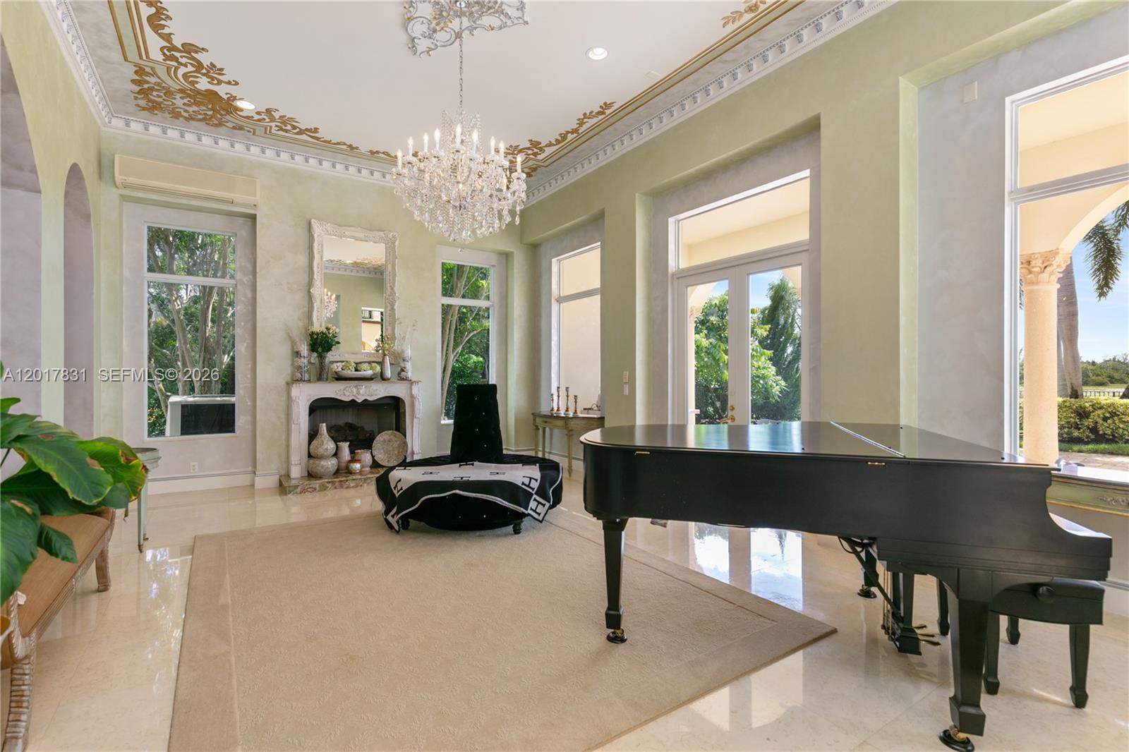 2951 Lake Ridge Lane Weston, FL 33332 - Photo 23 of 64 a living room with furniture a table and a large window