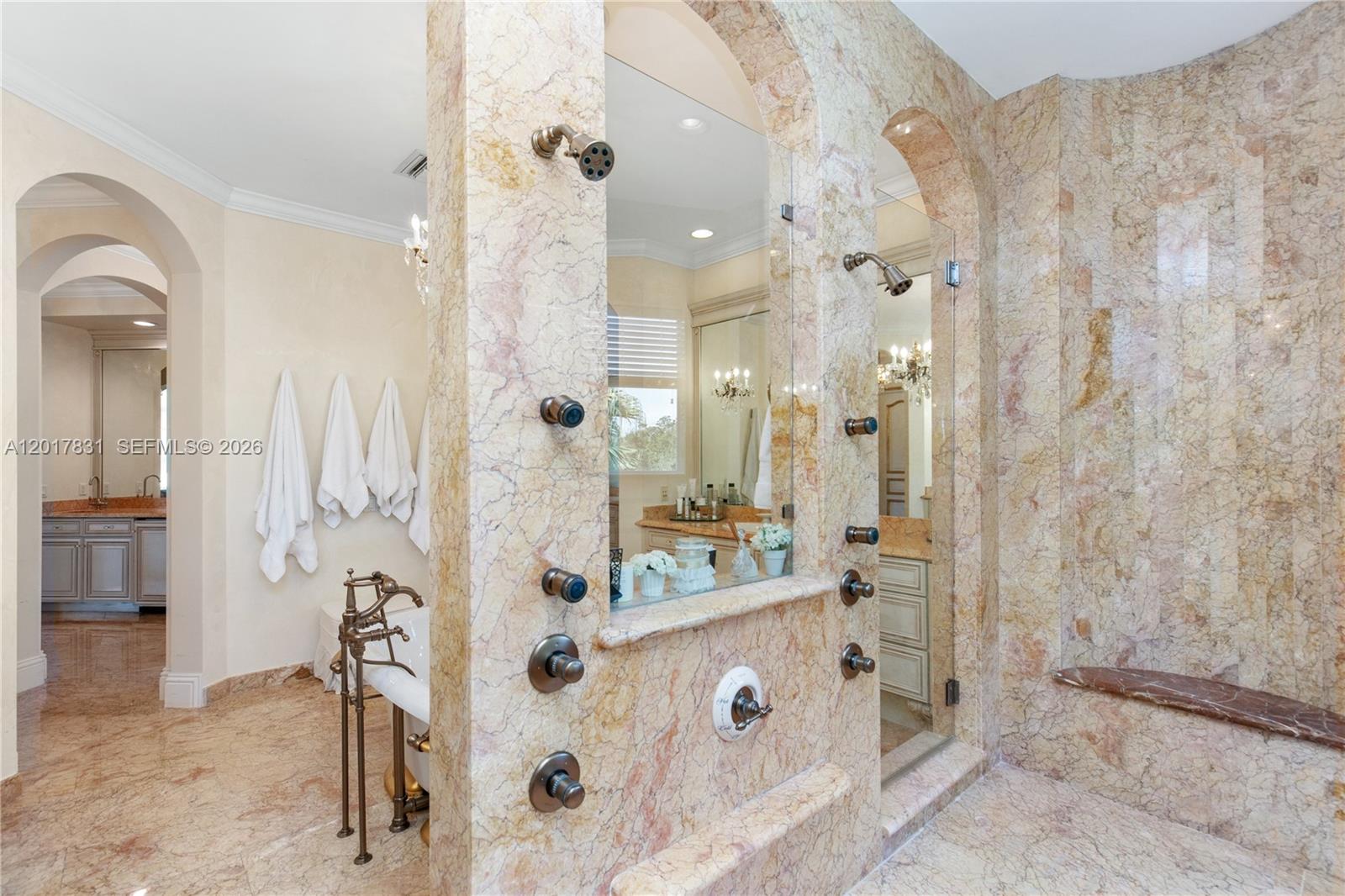 2951 Lake Ridge Lane Weston, FL 33332 - Photo 35 of 64 a bathroom with a double vanity sink a toilet a mirror and shower