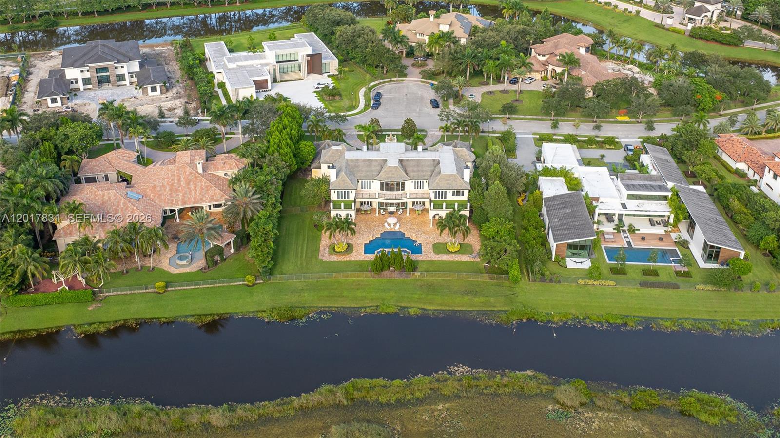 2951 Lake Ridge Lane Weston, FL 33332 - Photo 49 of 64 an aerial view of a house with yard swimming pool and outdoor seating