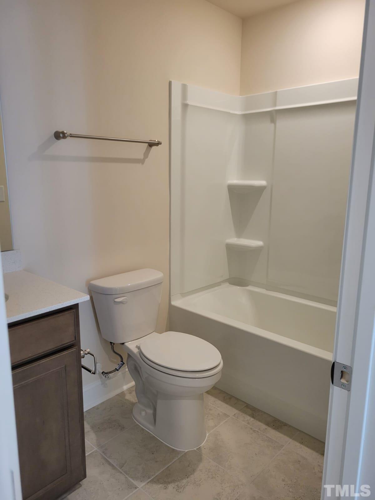 1178 Citadel Avenue Durham, NC 27713 - Photo 11 of 15 a bathroom with a toilet and a bathtub