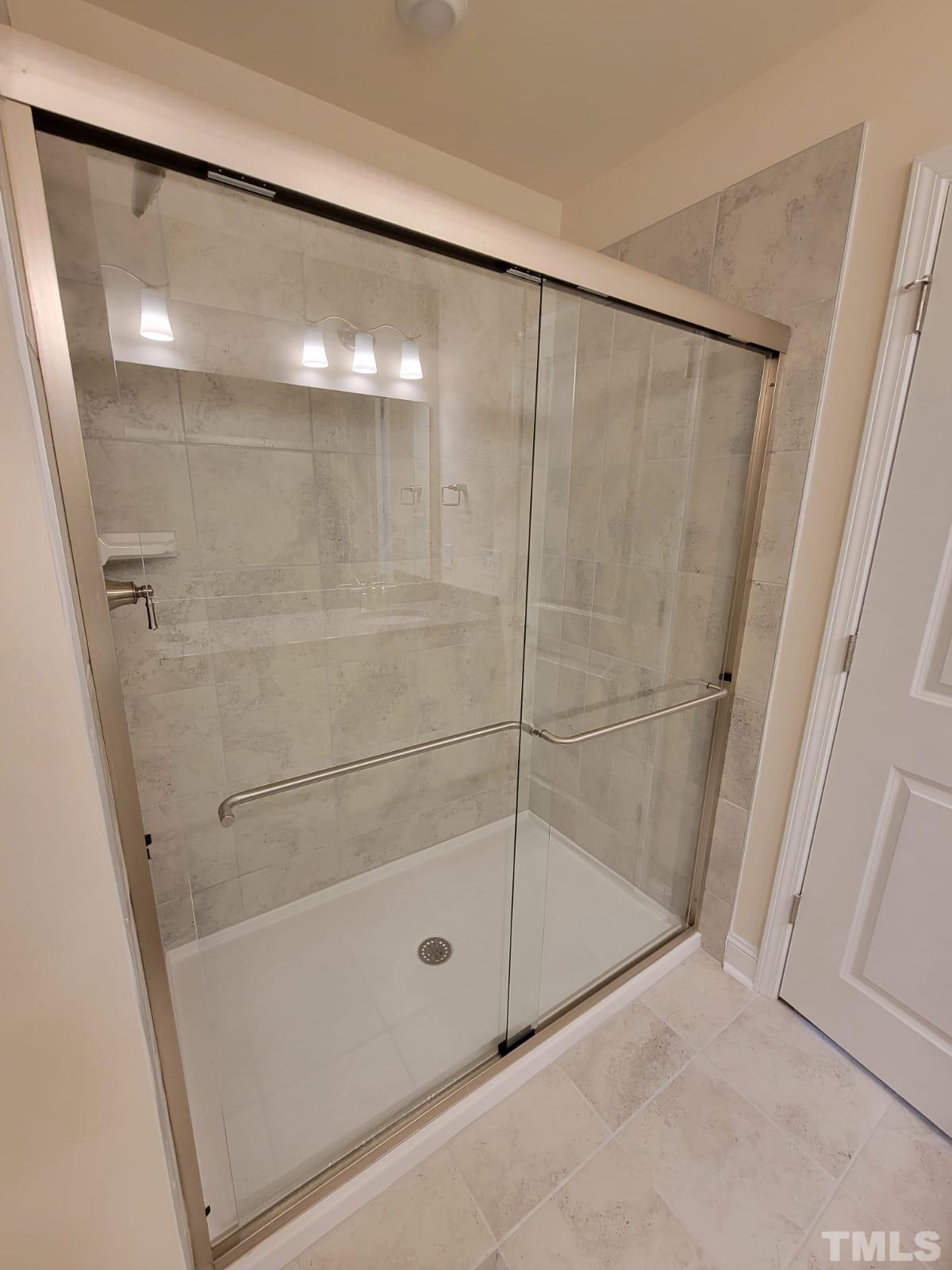 1178 Citadel Avenue Durham, NC 27713 - Photo 12 of 15 a bathroom with a shower