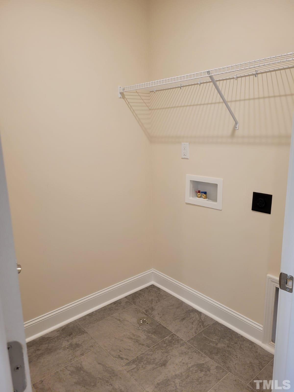 1178 Citadel Avenue Durham, NC 27713 - Photo 15 of 15 a view of a room with racks on the wall