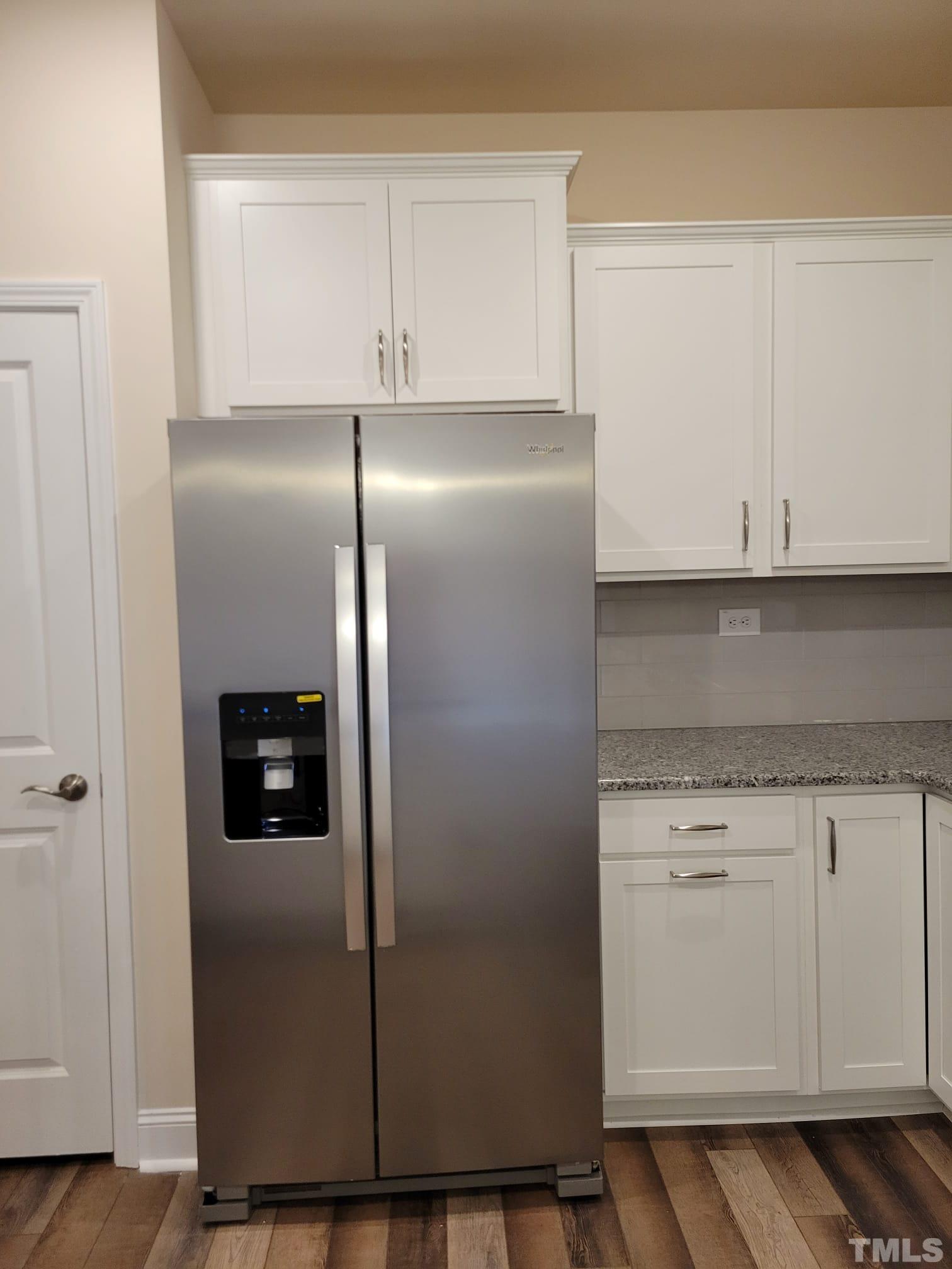 1178 Citadel Avenue Durham, NC 27713 - Photo 3 of 15 a close view of a refrigerator in kitchen counter top