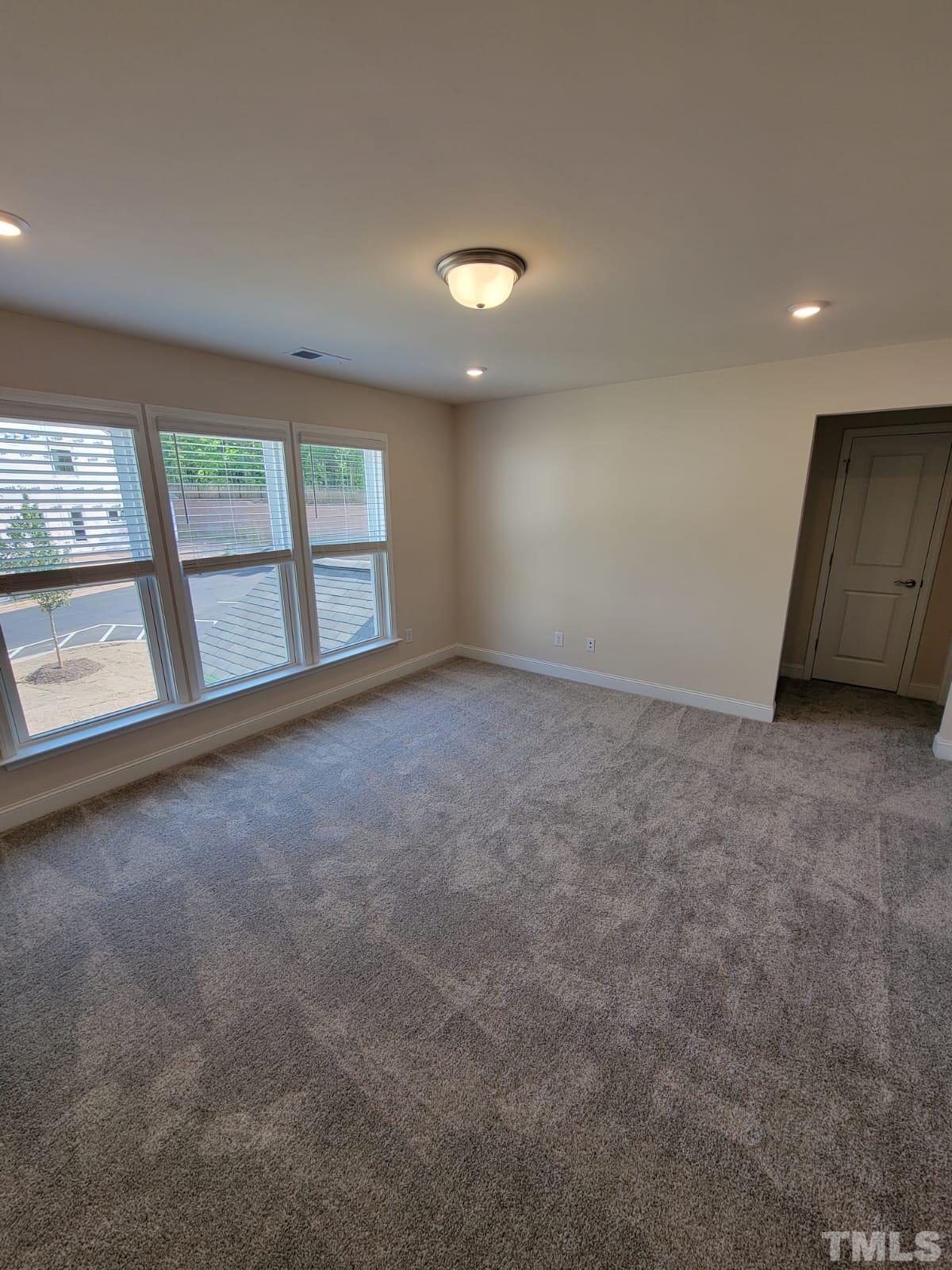 1178 Citadel Avenue Durham, NC 27713 - Photo 7 of 15 an empty room with windows