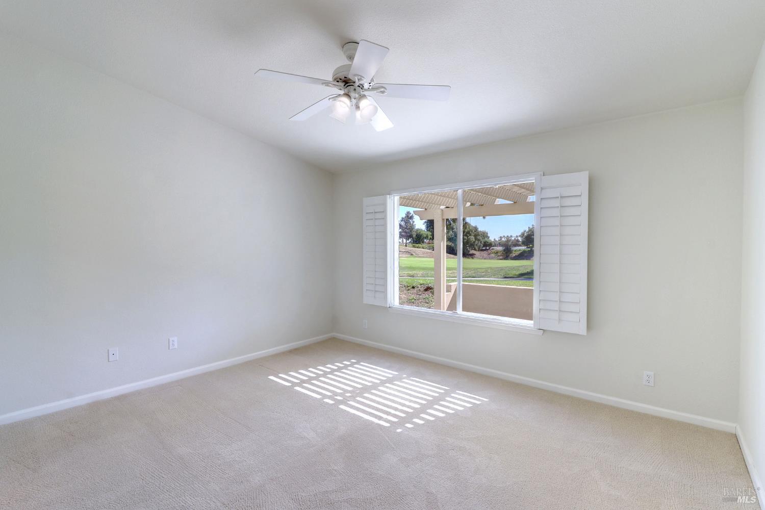 359 Glenn Lakes Drive Rio Vista, CA 94571 - Photo 12 of 34 primary bedroom with vaulted ceiling, ceiling fan, and plantation shutters