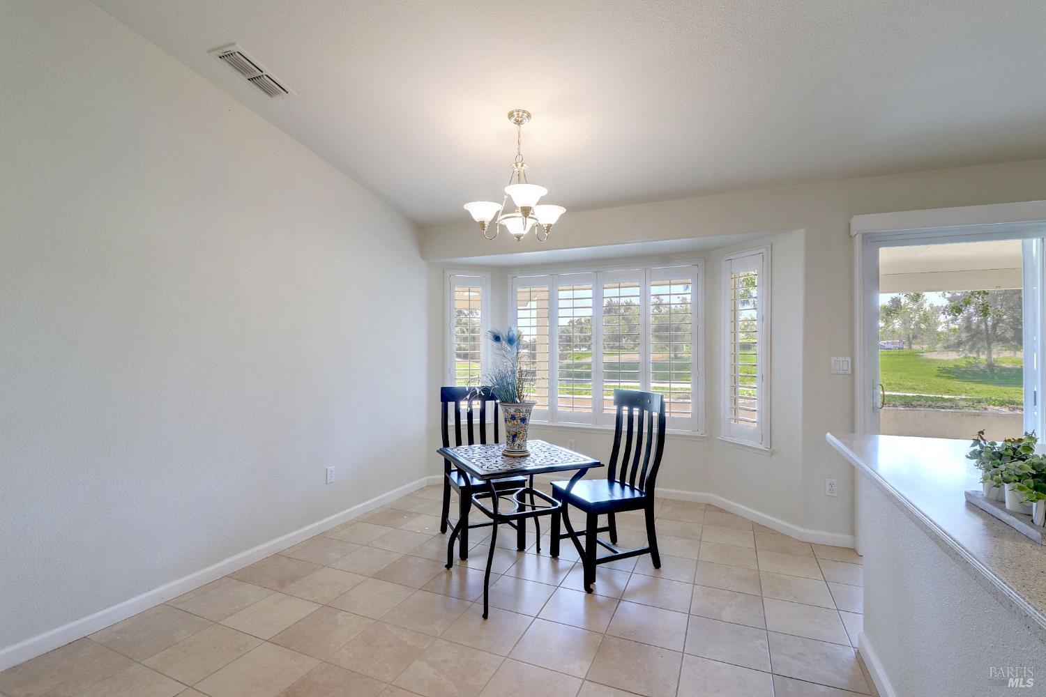 359 Glenn Lakes Drive Rio Vista, CA 94571 - Photo 6 of 34 dining room with bay window overlooking golf course