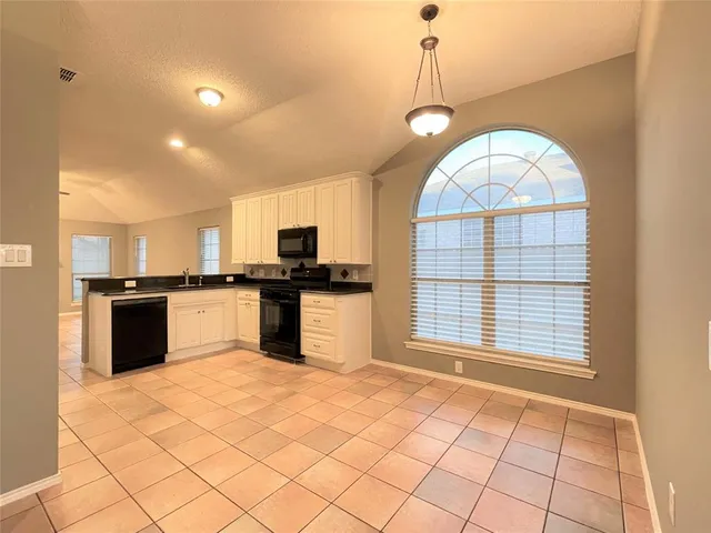 a view of a kitchen with marble kitchen and a sink
