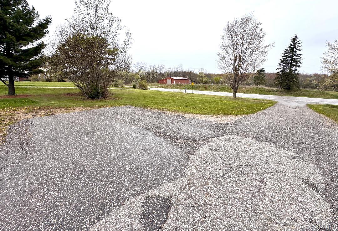 687 West Saginaw Road Mayville, MI 48744 - Photo 4 of 12 thumbnail687 paved dr.jpeg