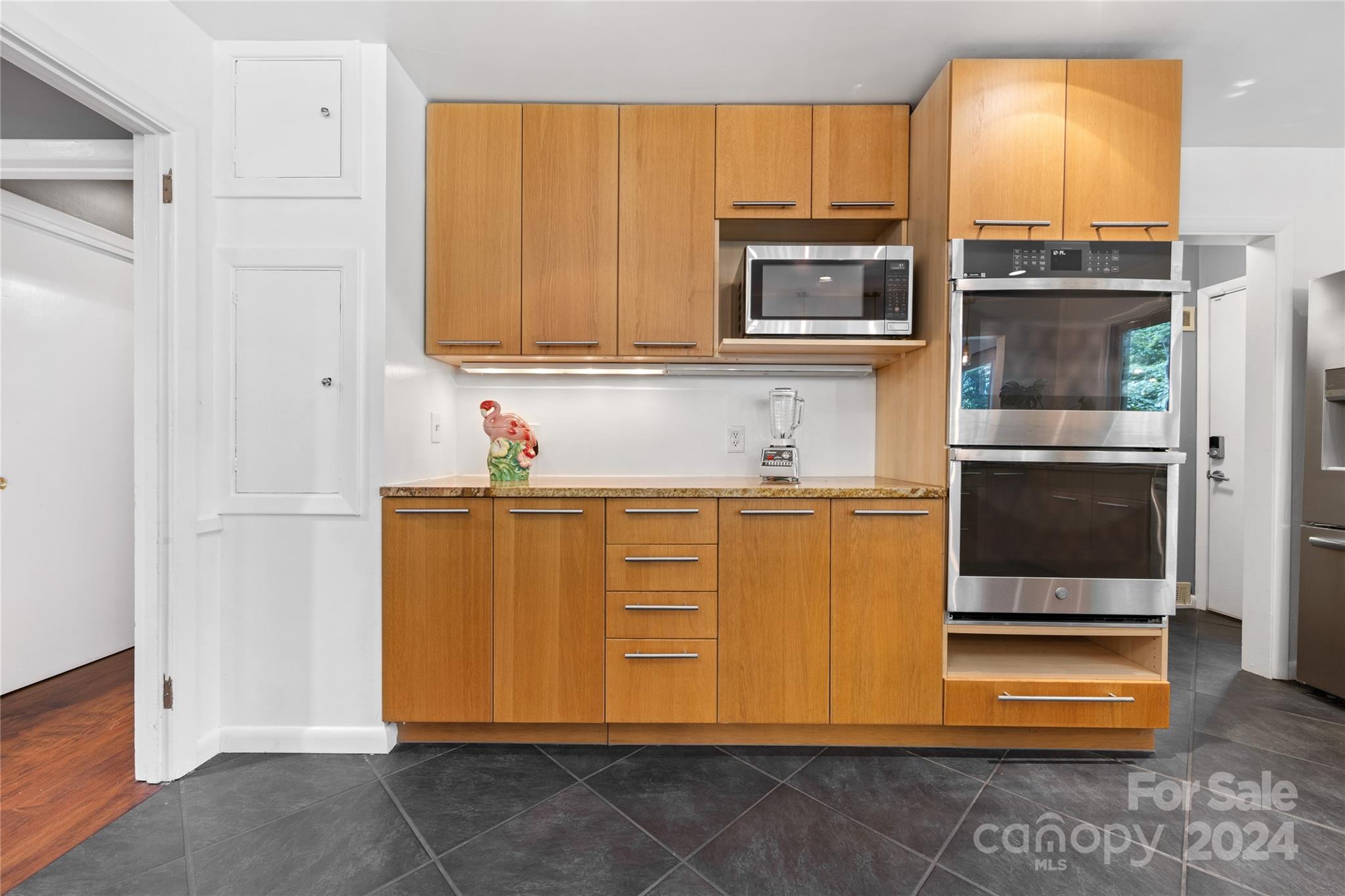 5601 Riviere Drive Charlotte, NC 28211 - Photo 12 of 38 a bathroom with a sink and a microwave