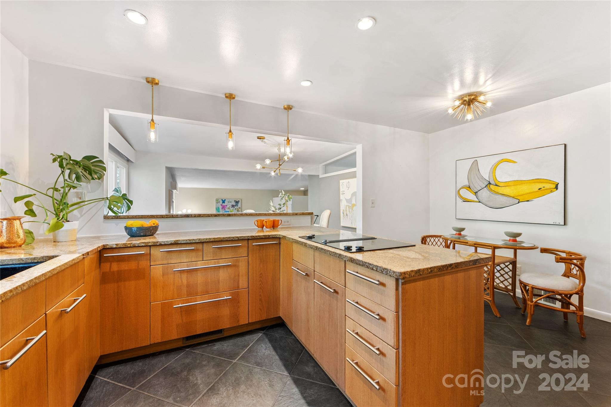 5601 Riviere Drive Charlotte, NC 28211 - Photo 15 of 38 a kitchen with a sink a counter space appliances and cabinets
