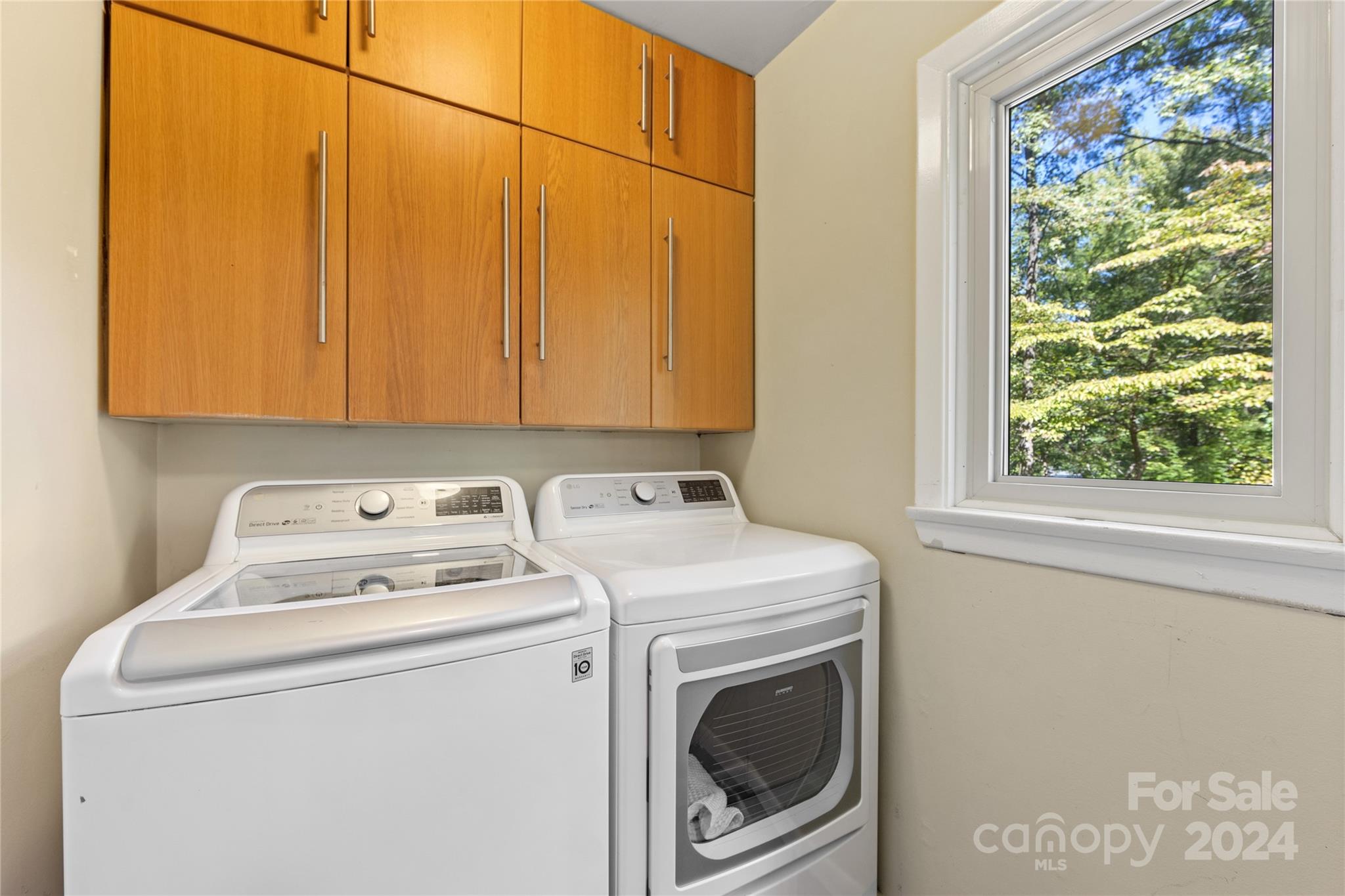 5601 Riviere Drive Charlotte, NC 28211 - Photo 18 of 38 a utility room with dryer and washer