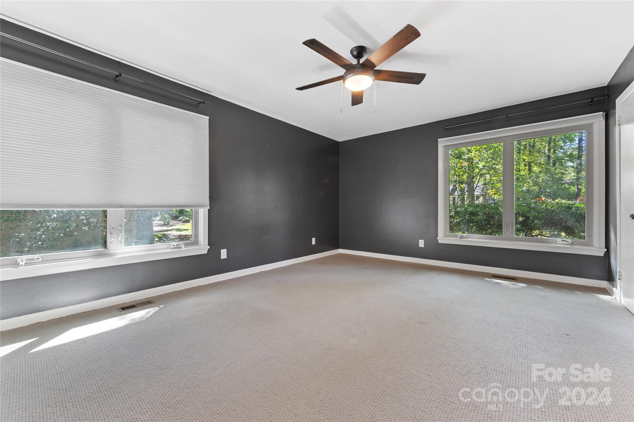 5601 Riviere Drive Charlotte, NC 28211 - Photo 25 of 38 a view of an empty room with a window