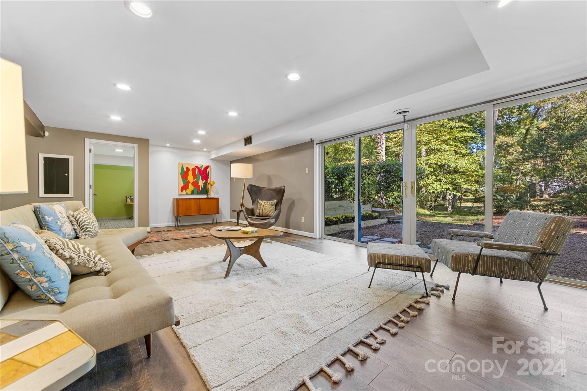 5601 Riviere Drive Charlotte, NC 28211 - Photo 29 of 38 a living room with furniture and a large window