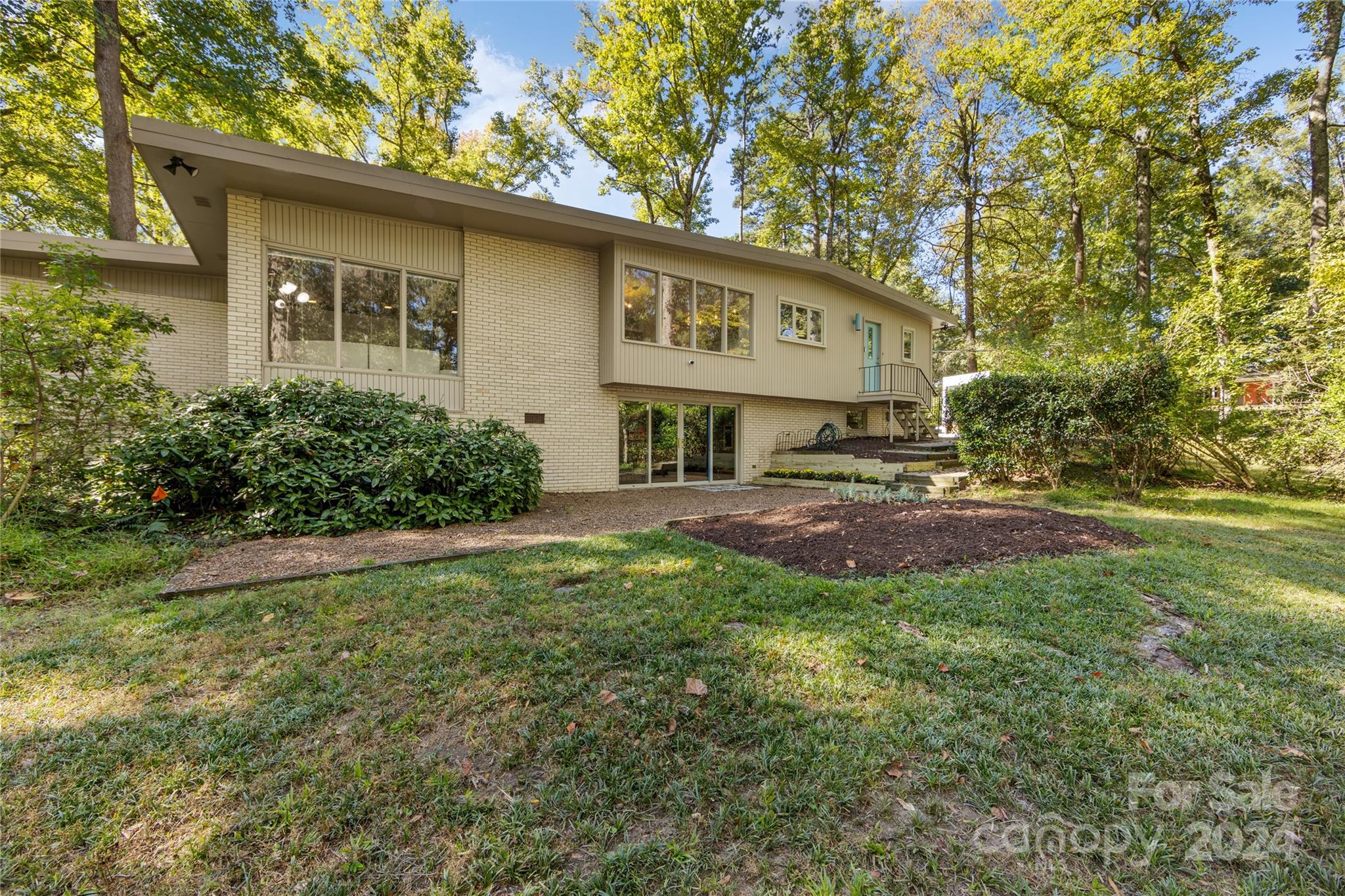 5601 Riviere Drive Charlotte, NC 28211 - Photo 37 of 38 a view of a house with a yard