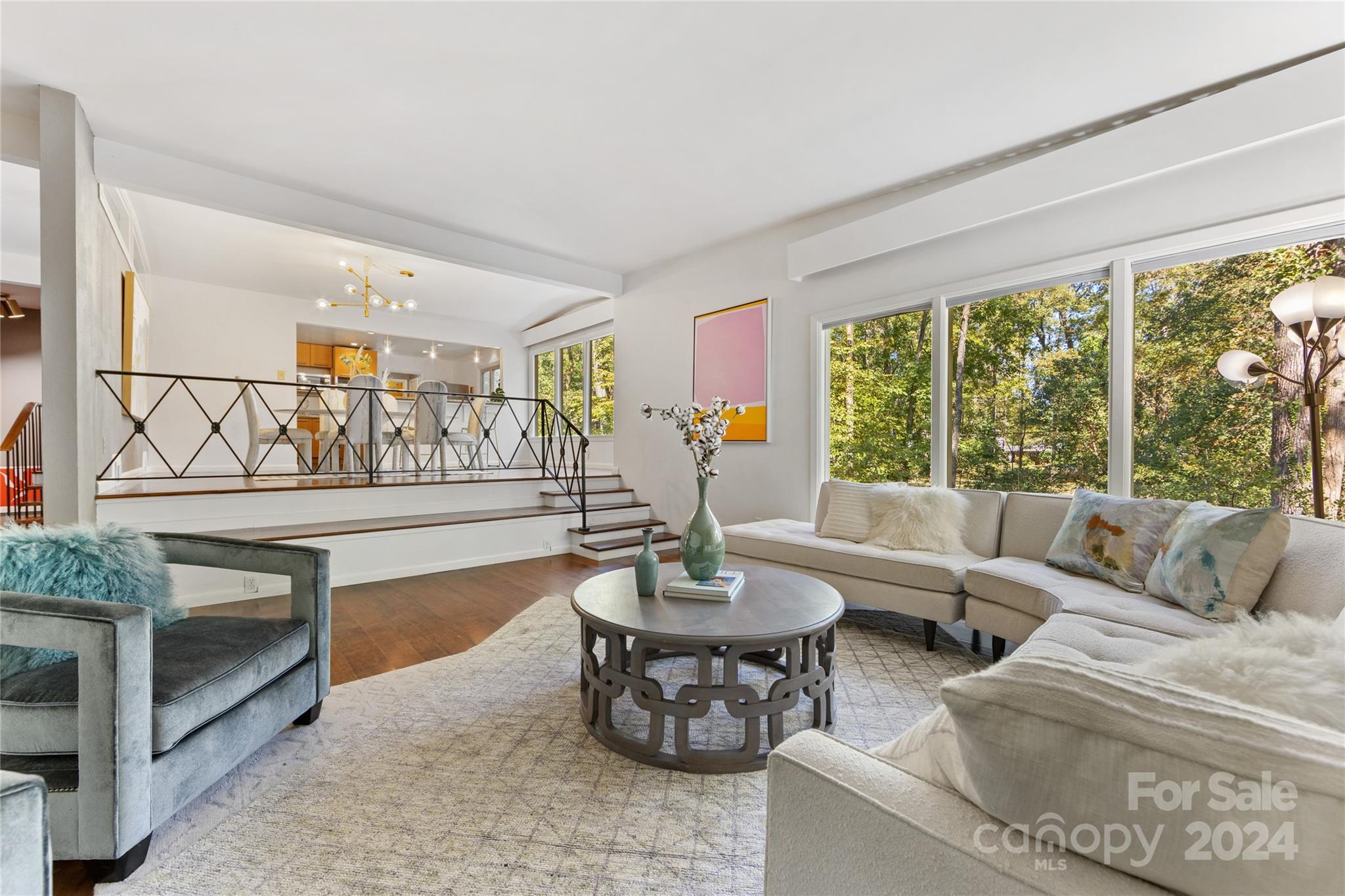 5601 Riviere Drive Charlotte, NC 28211 - Photo 8 of 38 a living room with furniture and a large window