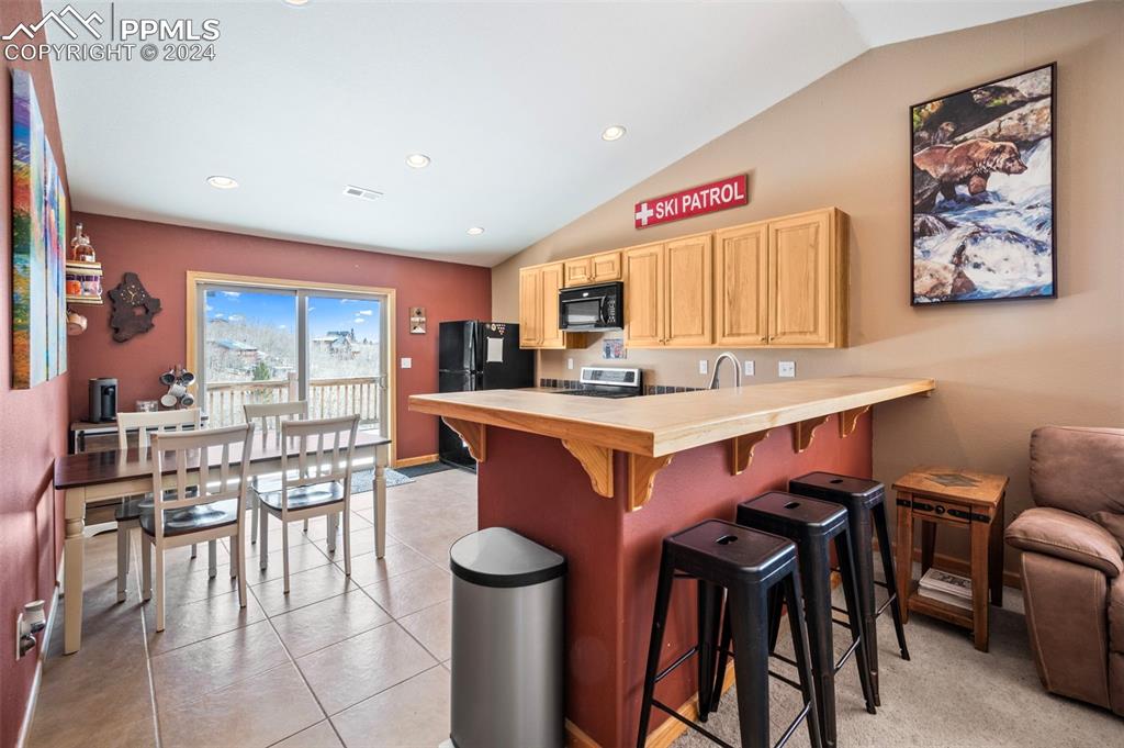 3156 High Creek Road Fairplay, CO 80440 - Photo 11 of 21 a kitchen with a table and chairs in it