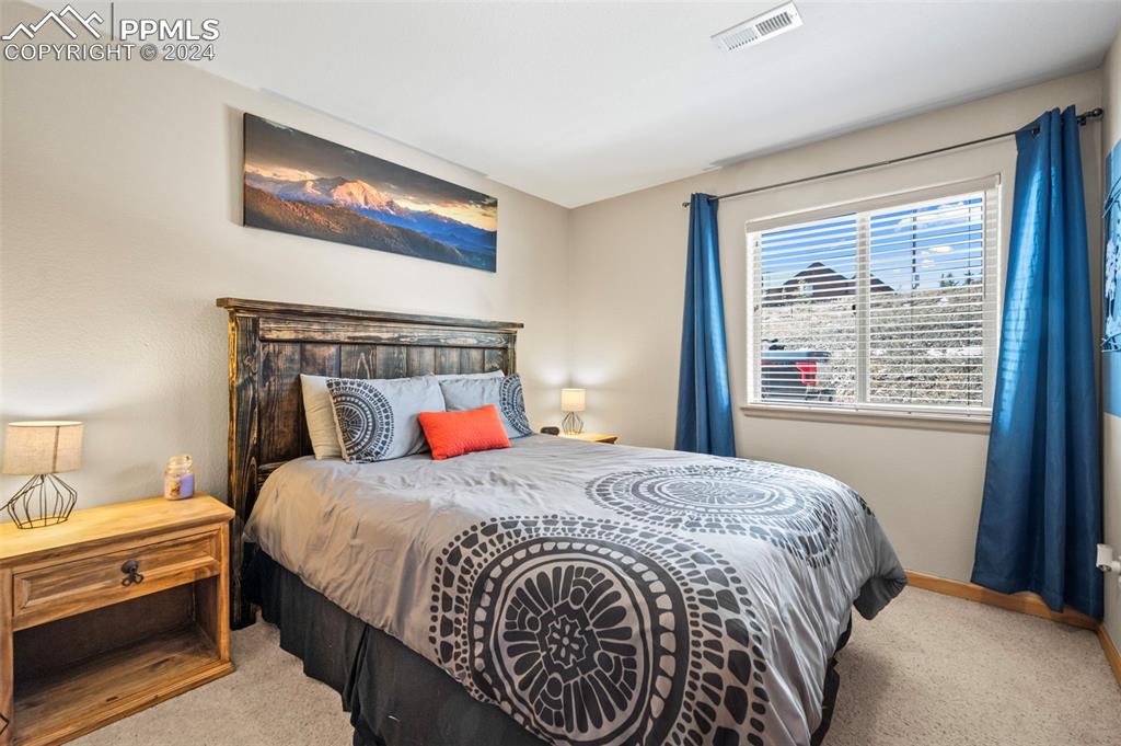 3156 High Creek Road Fairplay, CO 80440 - Photo 14 of 21 a bedroom with a bed and a window