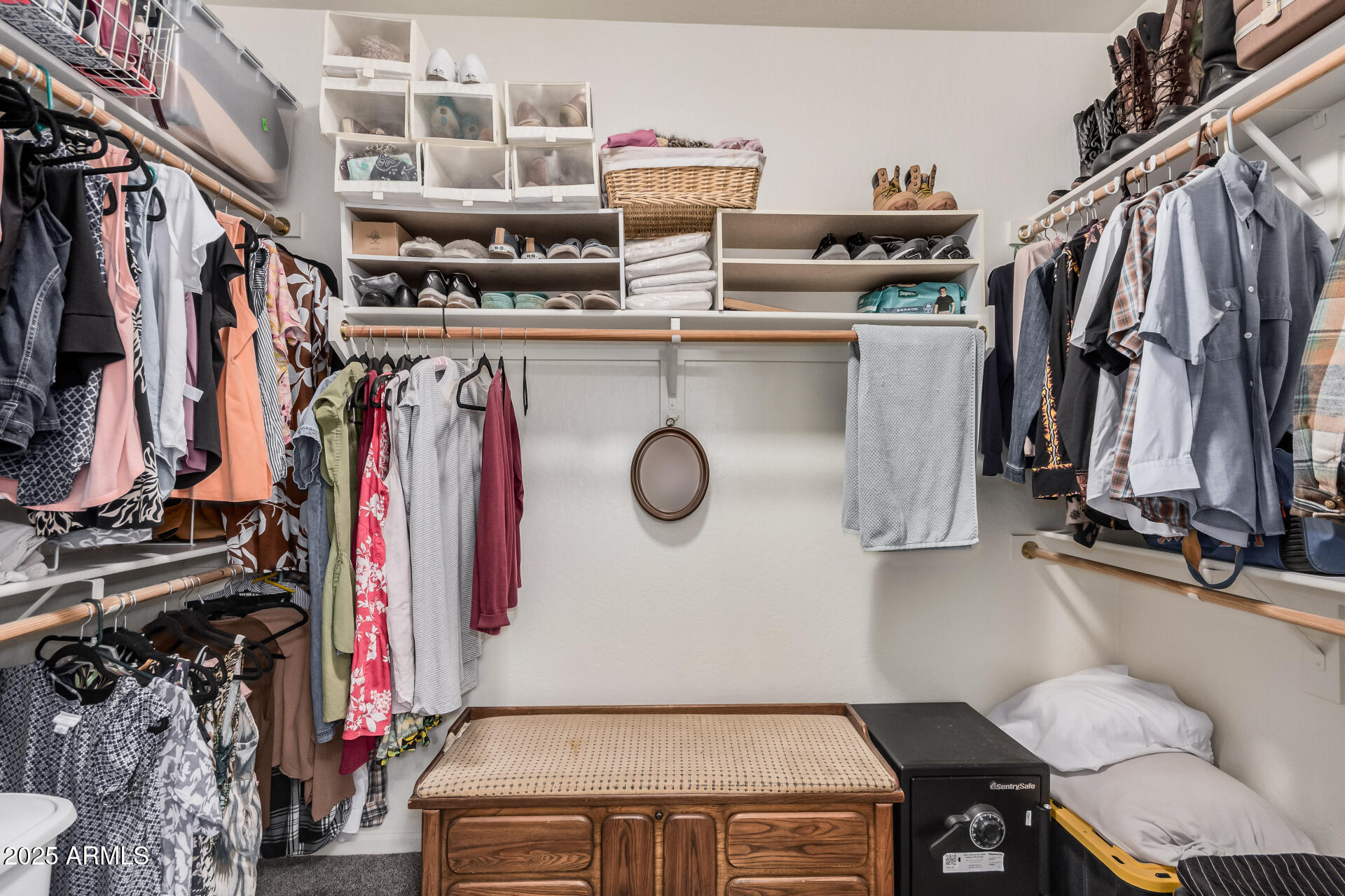 108 East Ridgeview Trail Casa Grande, AZ 85122 - Photo 18 of 34 a view of walk in closet with clothes