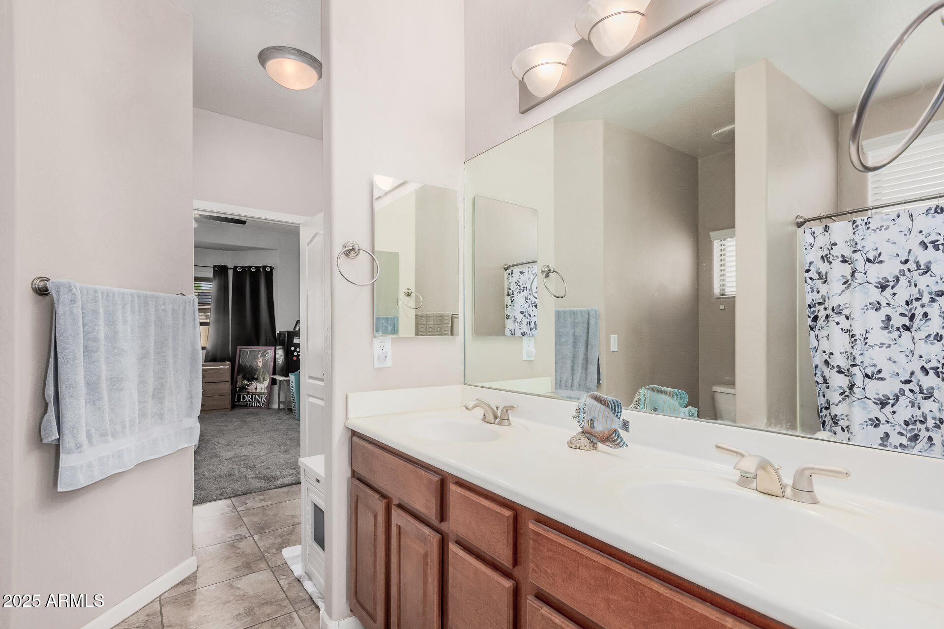 108 East Ridgeview Trail Casa Grande, AZ 85122 - Photo 23 of 34 a bathroom with a sink and a mirror