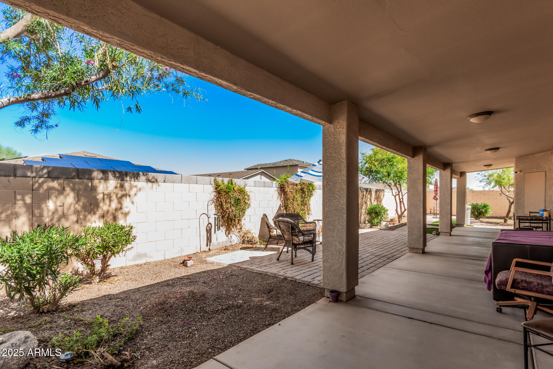 108 East Ridgeview Trail Casa Grande, AZ 85122 - Photo 27 of 34 a view of a porch with chairs and backyard