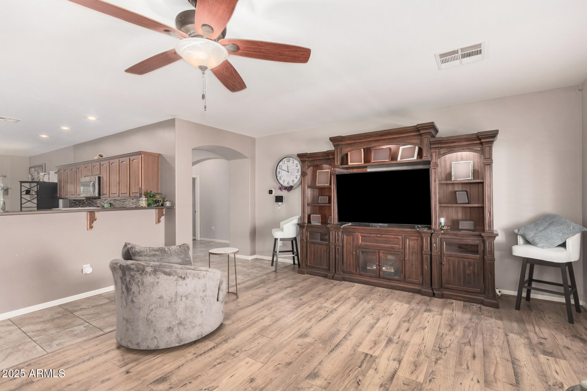 108 East Ridgeview Trail Casa Grande, AZ 85122 - Photo 7 of 34 a living room with furniture and a flat screen tv