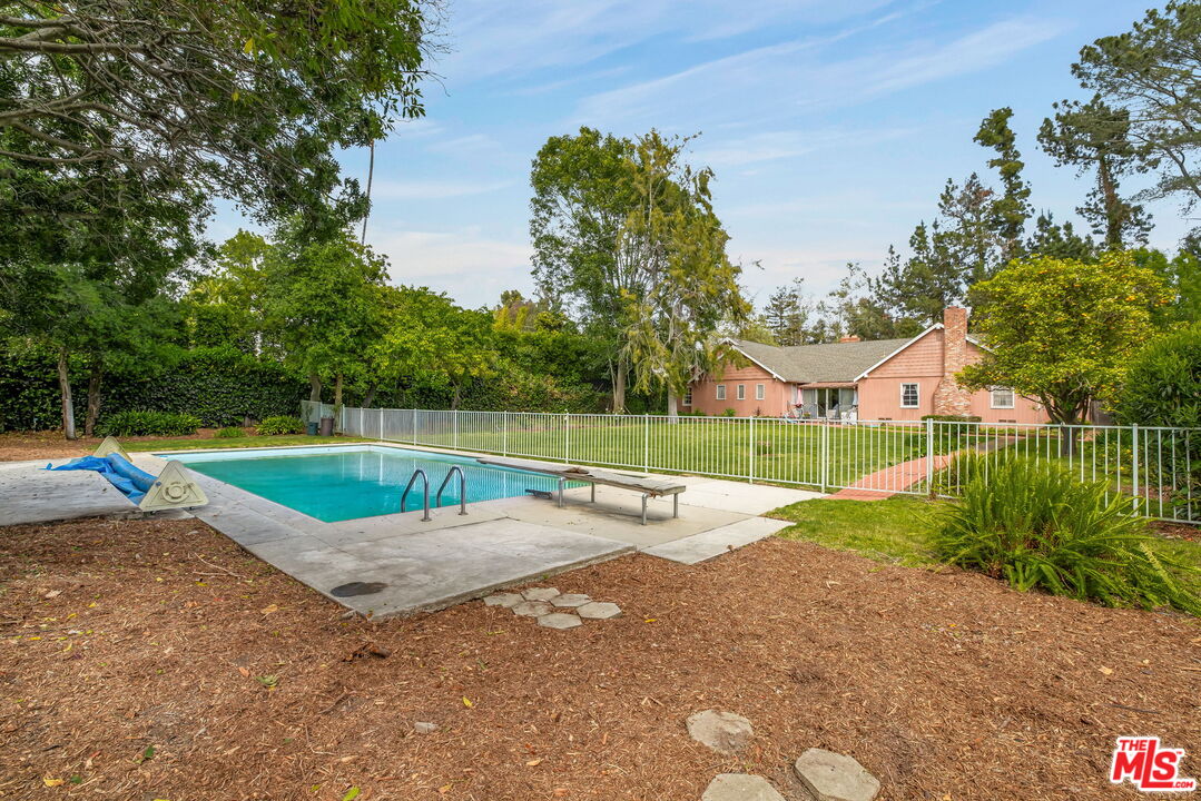 1639 Mandeville Canyon Road Los Angeles, CA 90049 - Photo 5 of 10 a view of a park with a slide