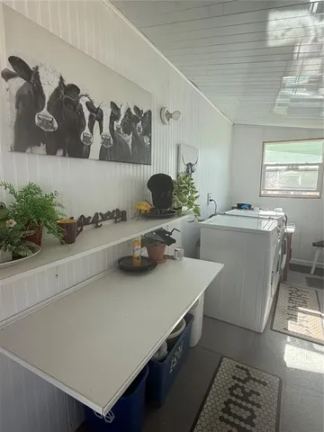 a room with a sink and cabinets