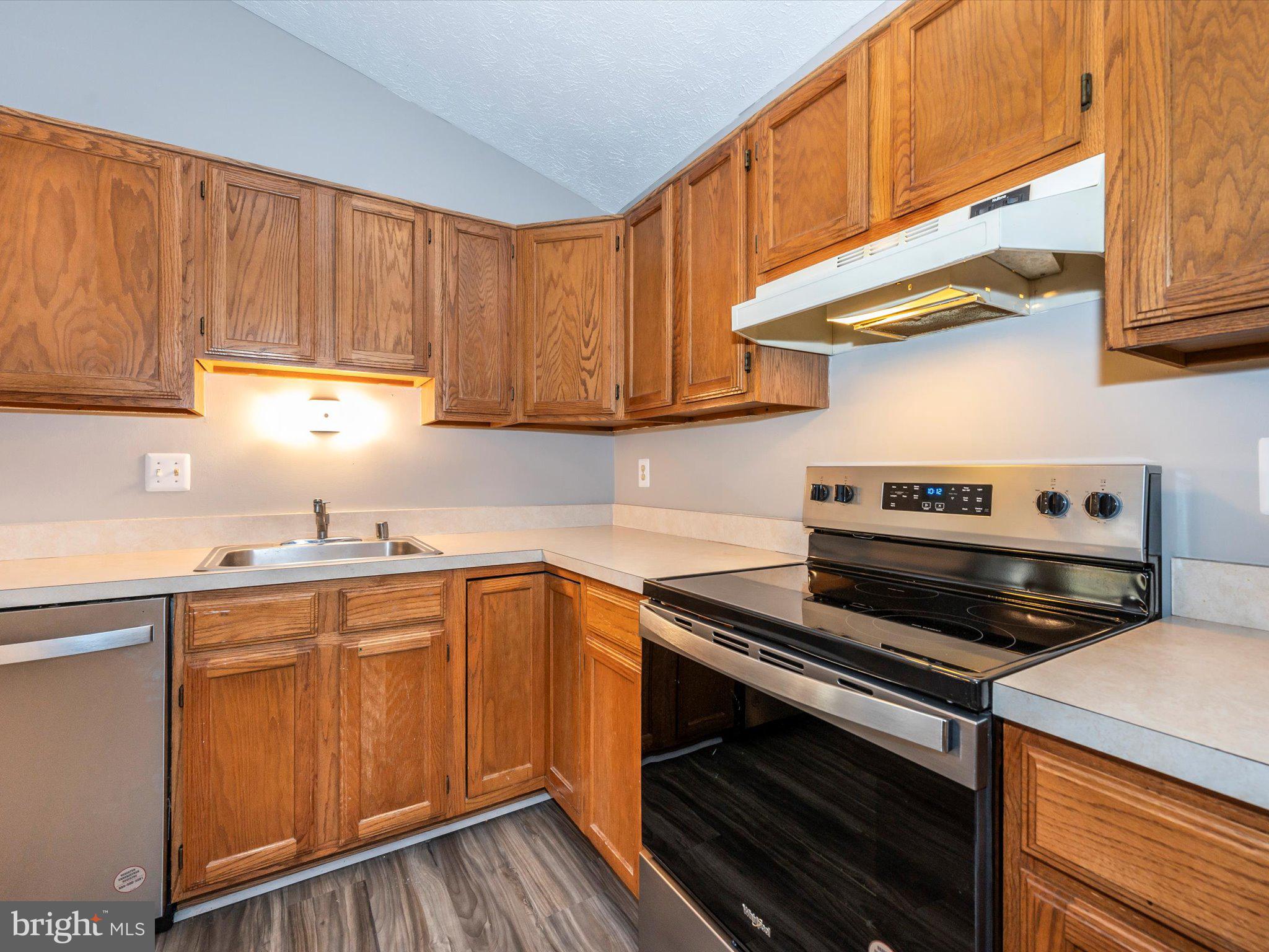 2112 Whitehall Road, Unit 2C Frederick, MD 21702 - Photo 22 of 59 a kitchen with a stove and a sink