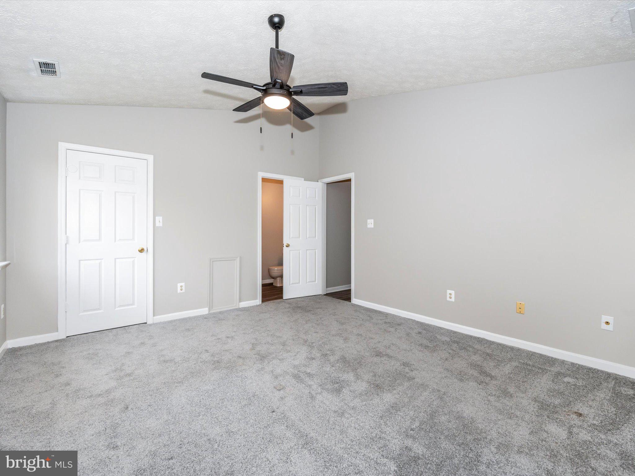 2112 Whitehall Road, Unit 2C Frederick, MD 21702 - Photo 29 of 59 an empty room with a fan & a window