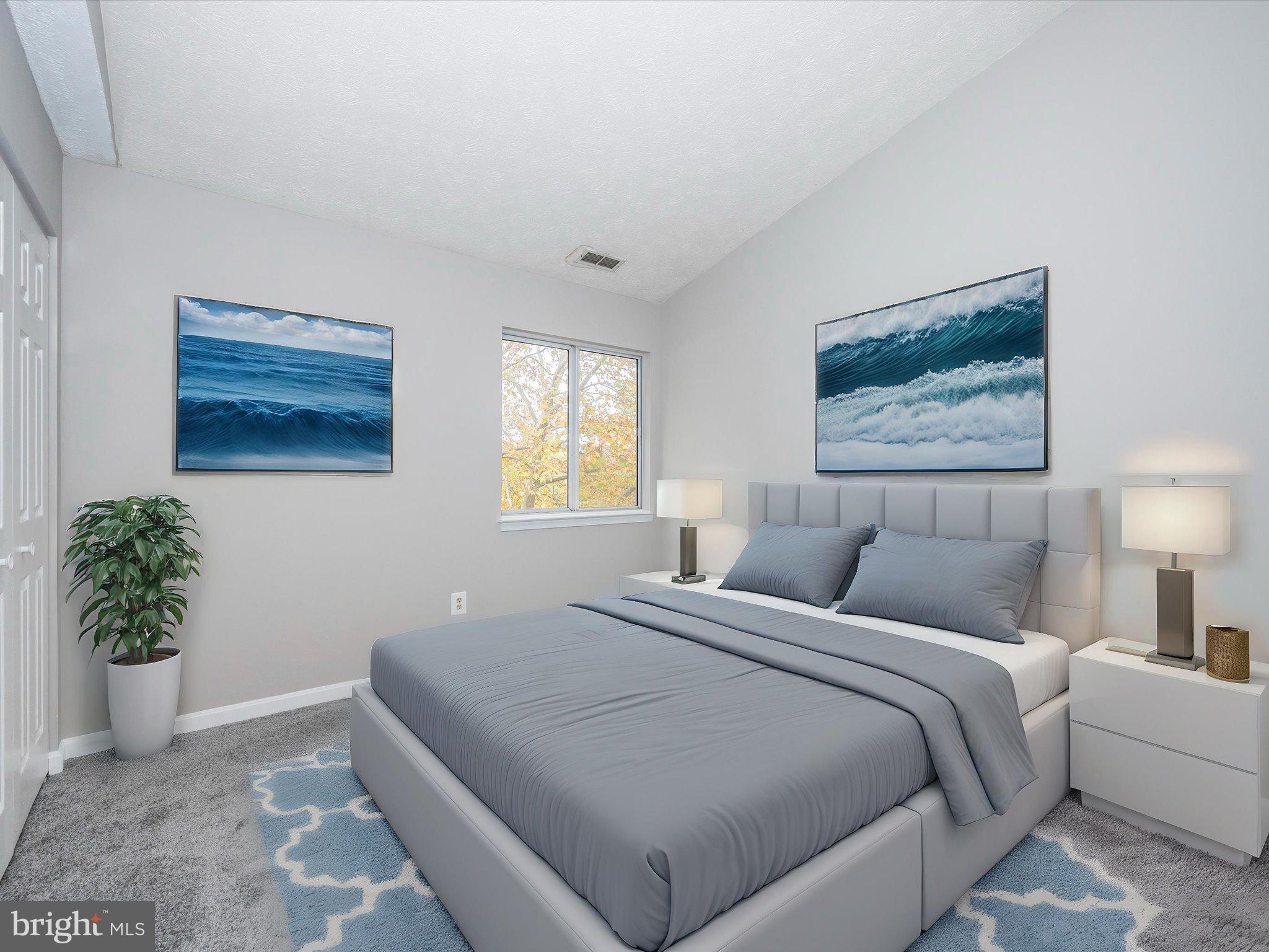 2112 Whitehall Road, Unit 2C Frederick, MD 21702 - Photo 33 of 59 a bedroom with a bed and a potted plant