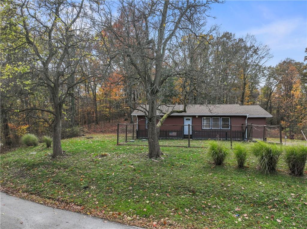 a backyard of a house with lots of green space