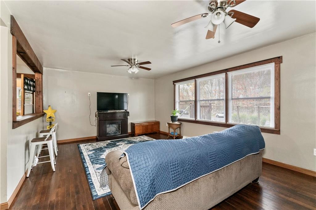 299 Ridge Road Darlington, PA 16115 - Photo 11 of 31 a living room with fireplace furniture and a flat screen tv