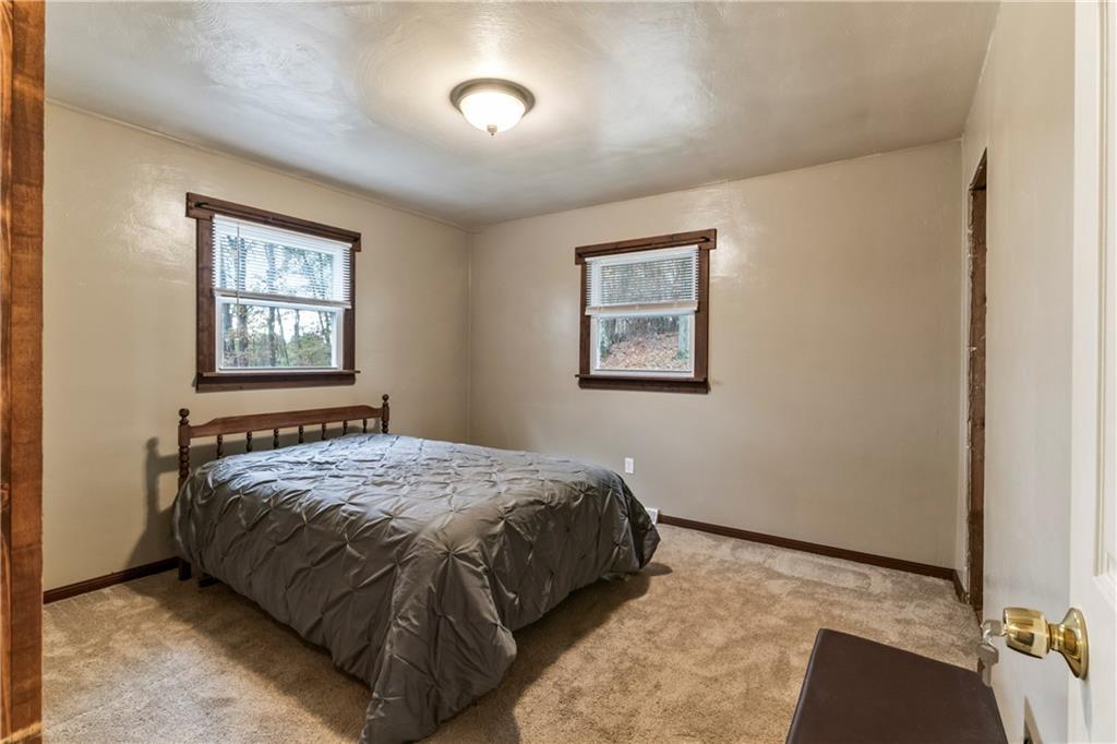 299 Ridge Road Darlington, PA 16115 - Photo 22 of 31 a bedroom with a bed and a window