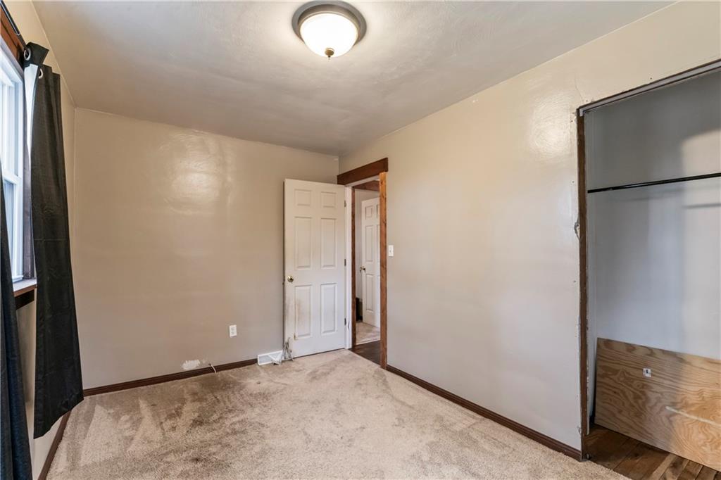 299 Ridge Road Darlington, PA 16115 - Photo 25 of 31 a view of an empty room with a window