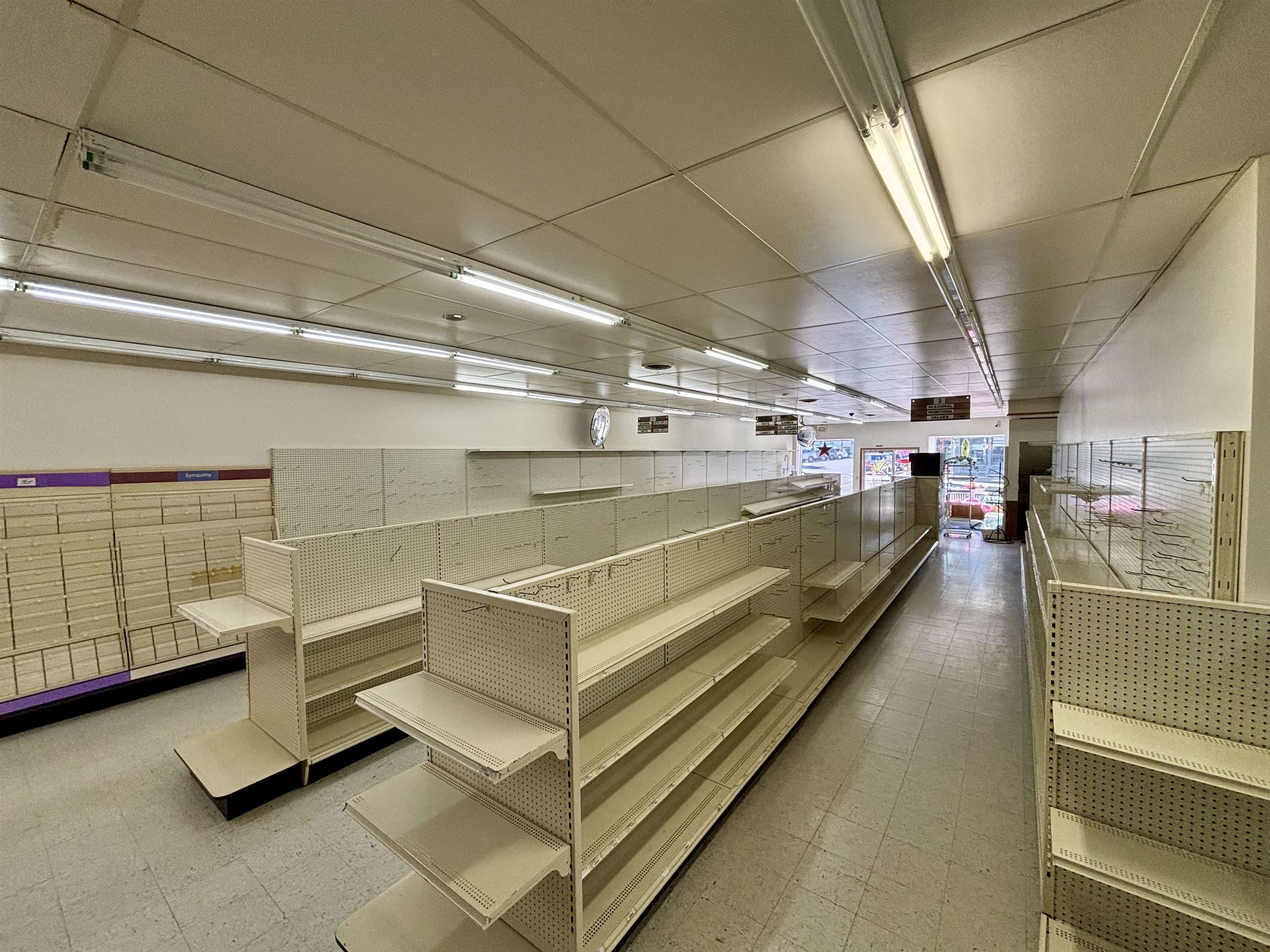 101 West Market Street Mount Carroll, IL 61053 - Photo 6 of 26 a view of a room with racks