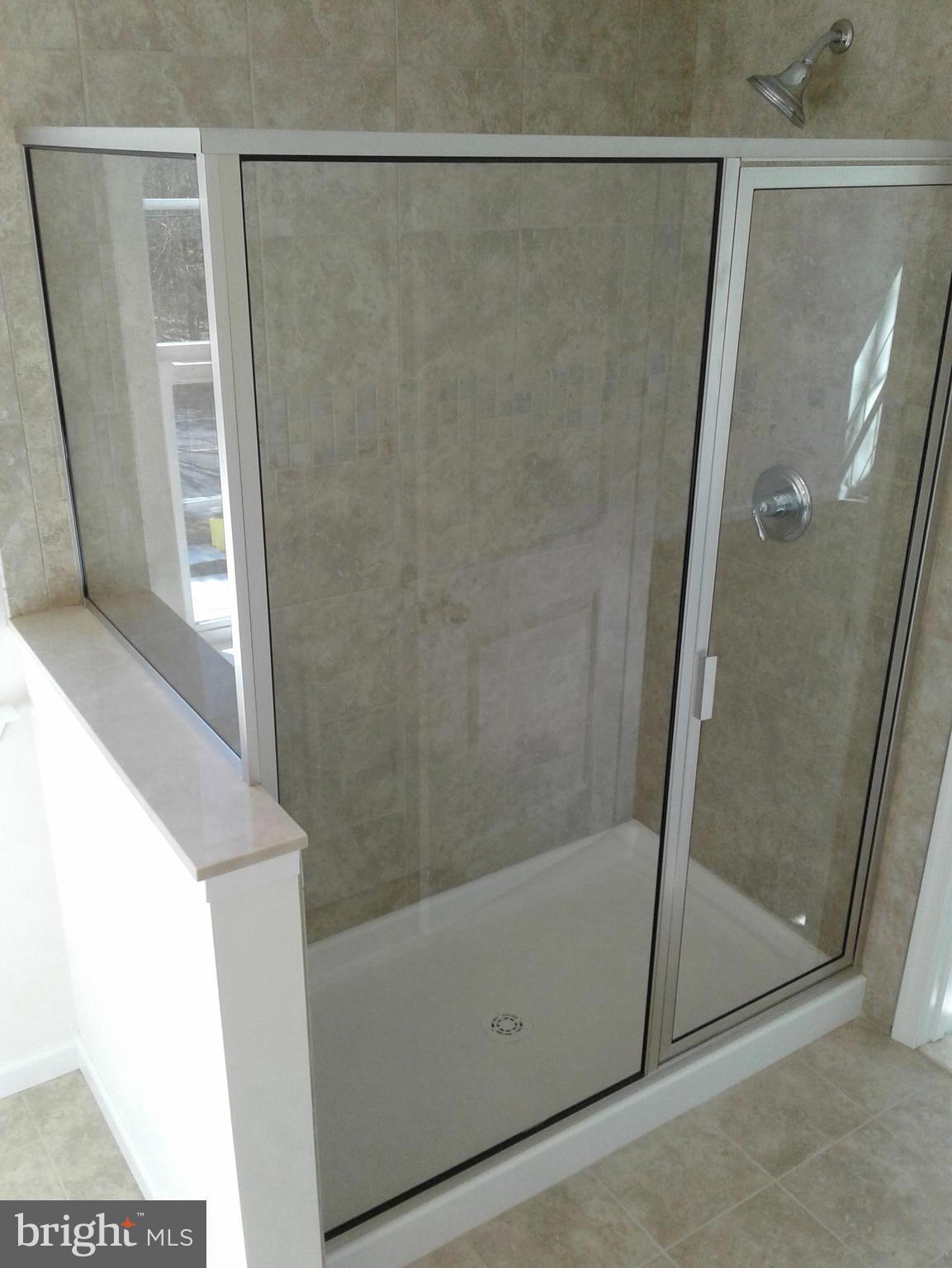 131 Cooper Folly Road Atco, NJ 08004 - Photo 12 of 26 a bathroom with a glass door shower