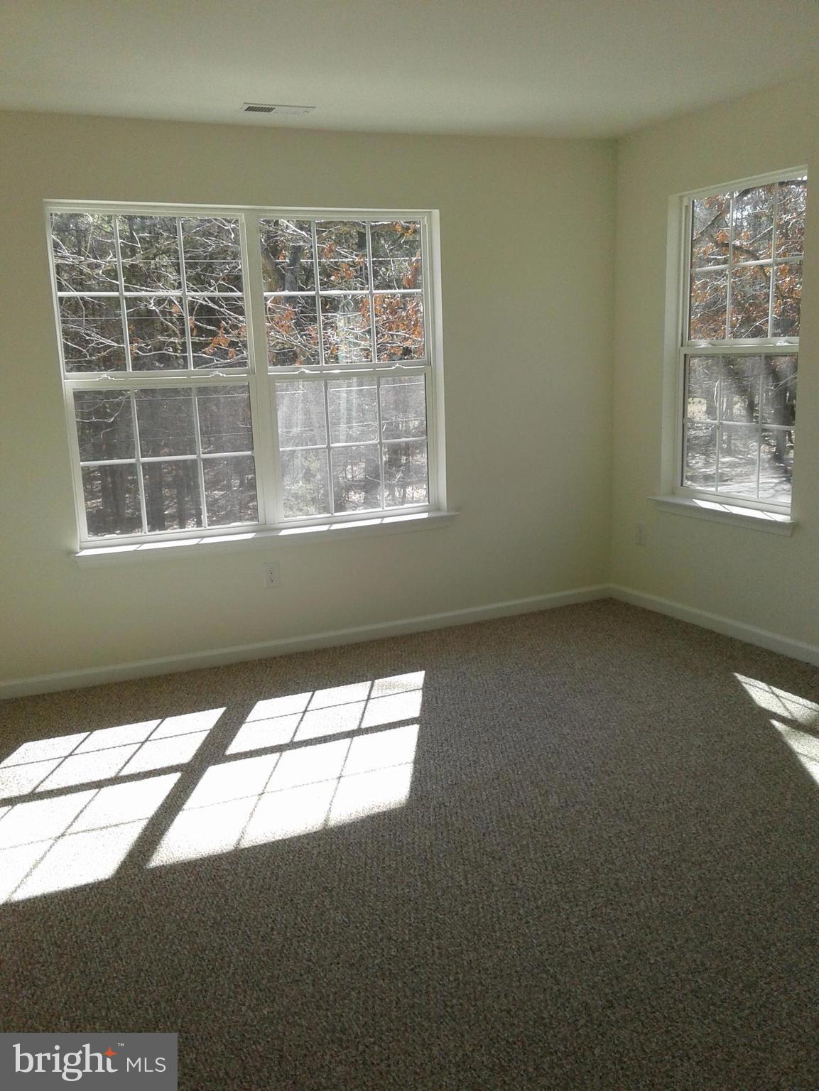 131 Cooper Folly Road Atco, NJ 08004 - Photo 17 of 26 a view of an empty room with a window