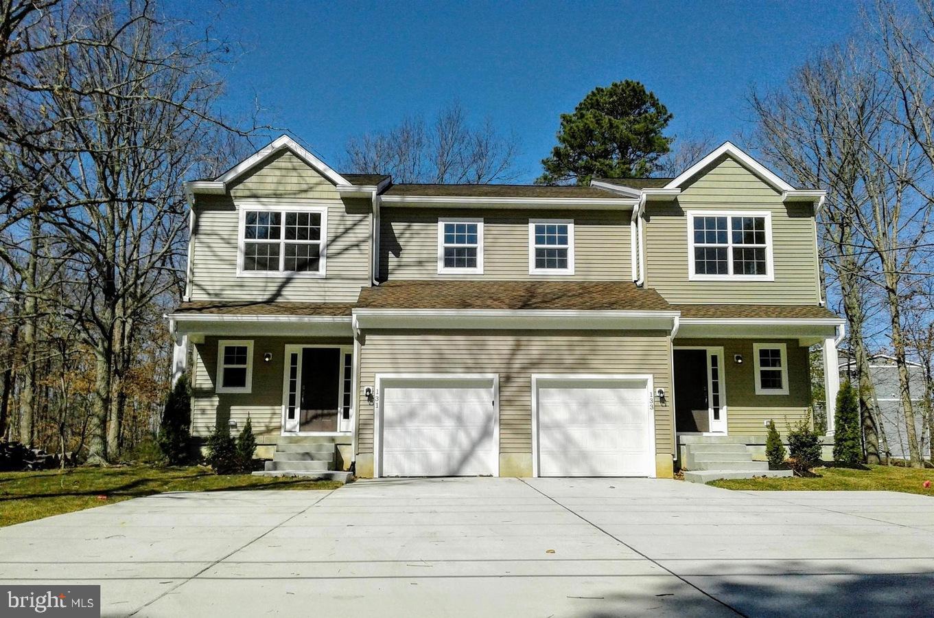 131 Cooper Folly Road Atco, NJ 08004 - Photo 2 of 26 a front view of a house with a yard